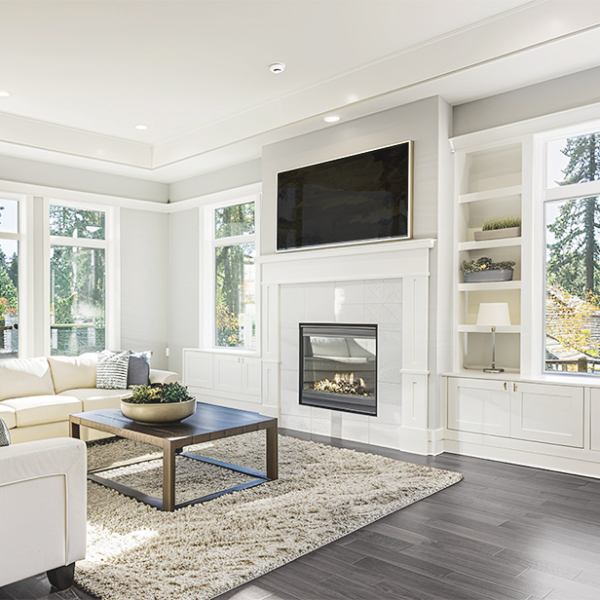Wall-to-wall entertainment unit with floating shelves and inset lighting in St. Petersburg living room