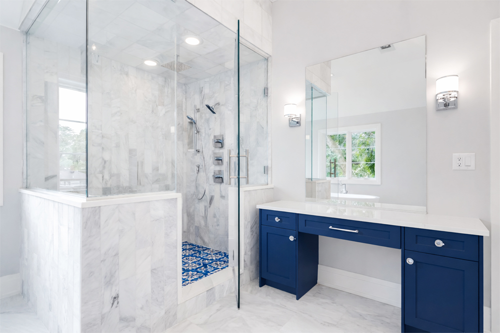Bathroom Remodeling with Walk-In Shower and Custom Vanity Bathroom remodeling featuring a walk-in shower, custom vanity, and durable tile finishes designed for everyday use
