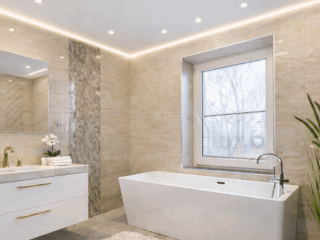 Bathroom lighting and ventilation system in Tampa Bay remodel with modern vanity and soaking tub